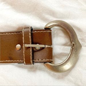 Brown leather belt with silver buckle